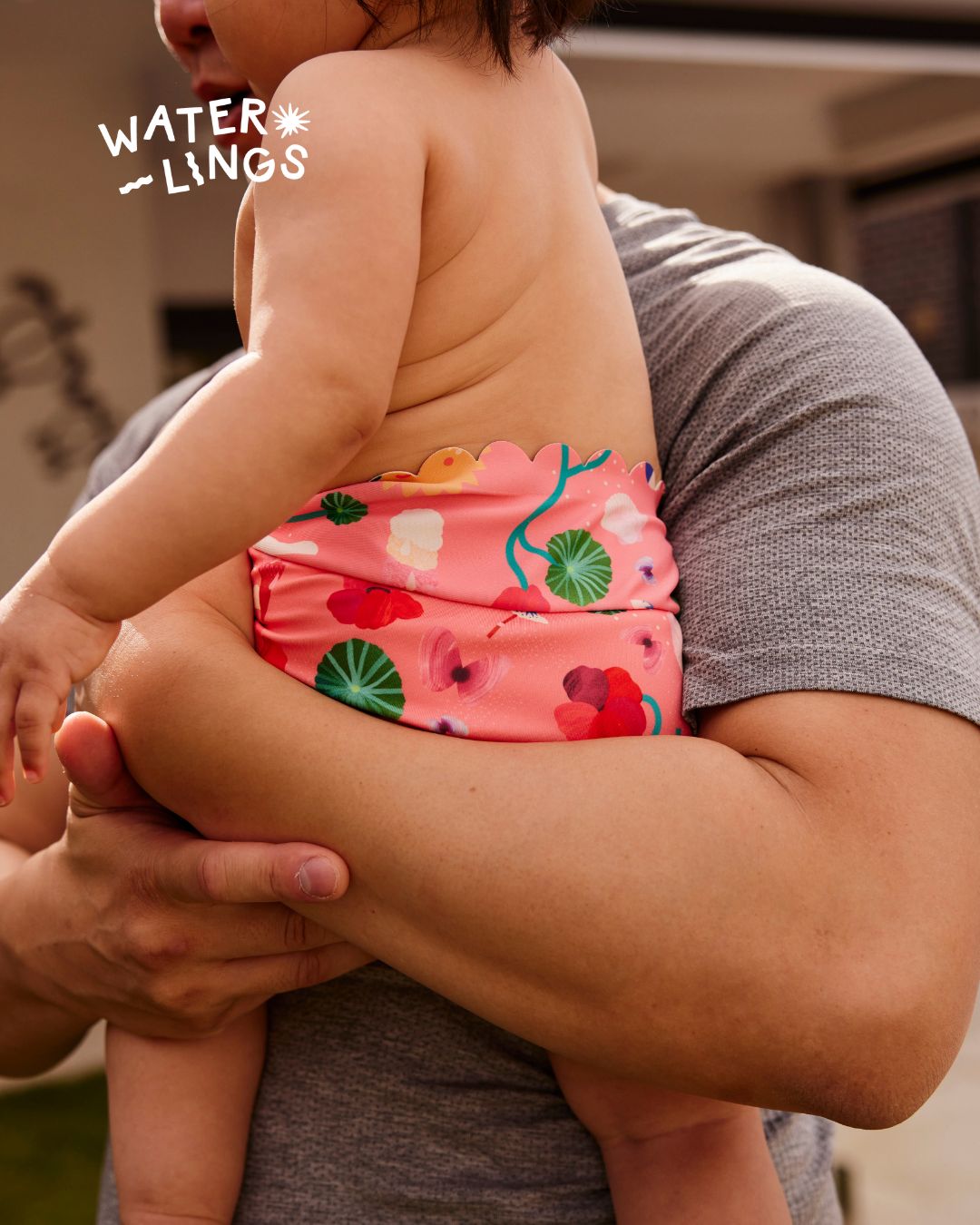 Baby wearing a reusable swim nappy