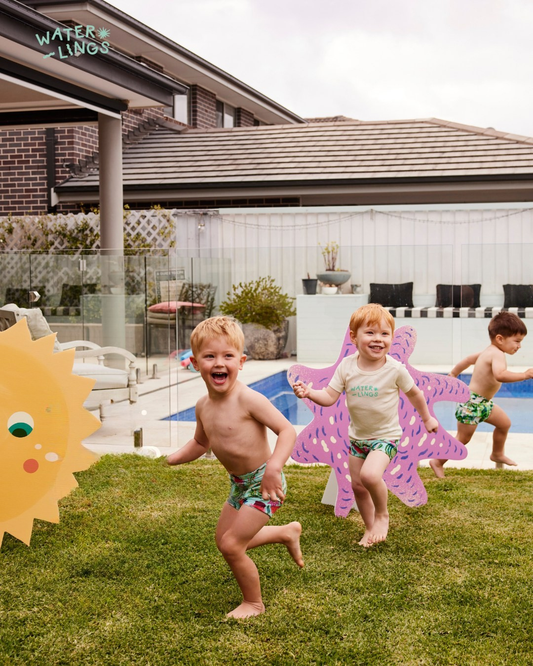 Children in reusable swim nappies at the pool