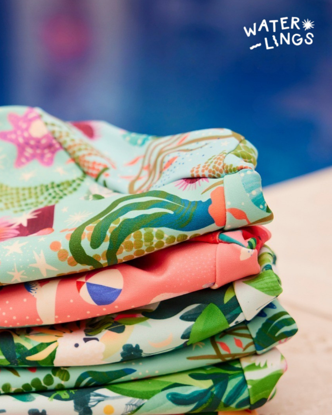 Folded reusable swim nappies ready for washing