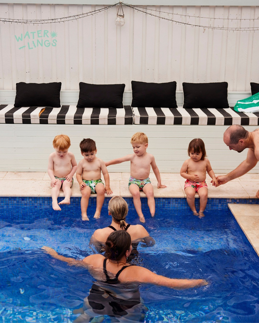 Kids in reusable swim nappies at swim lessons